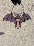 Intricate stained glass bats