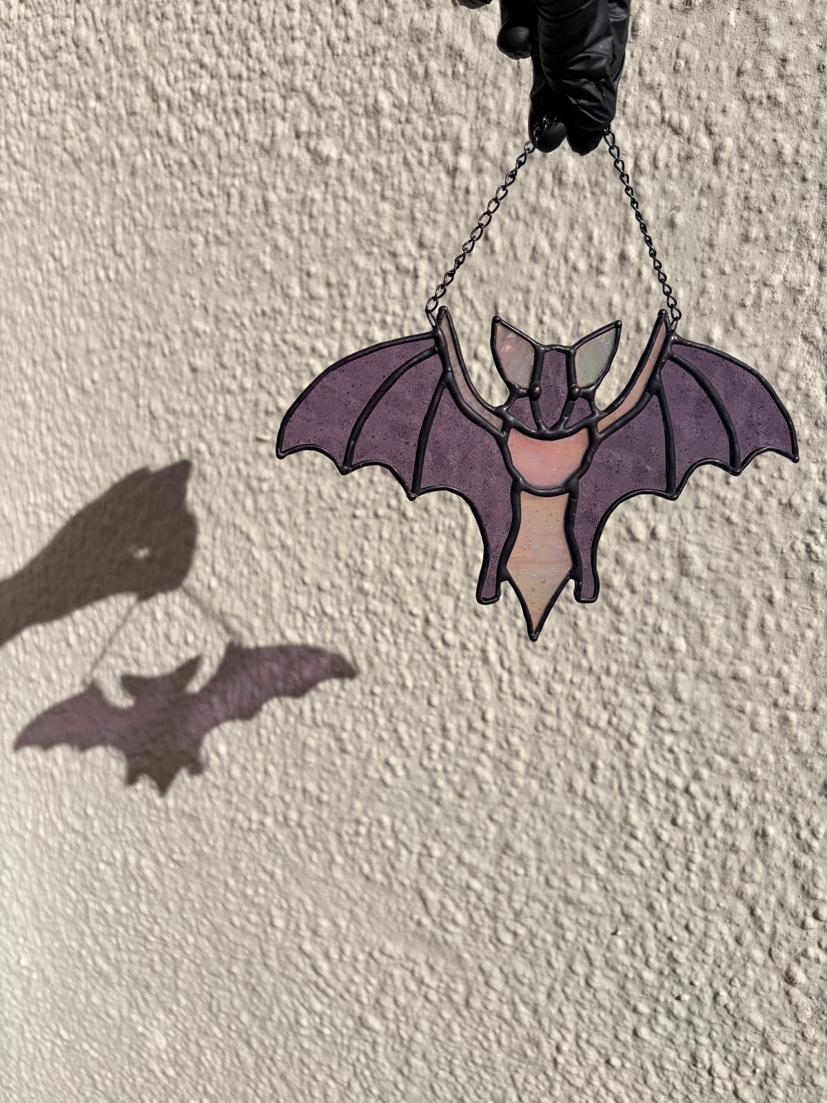 Intricate stained glass bats