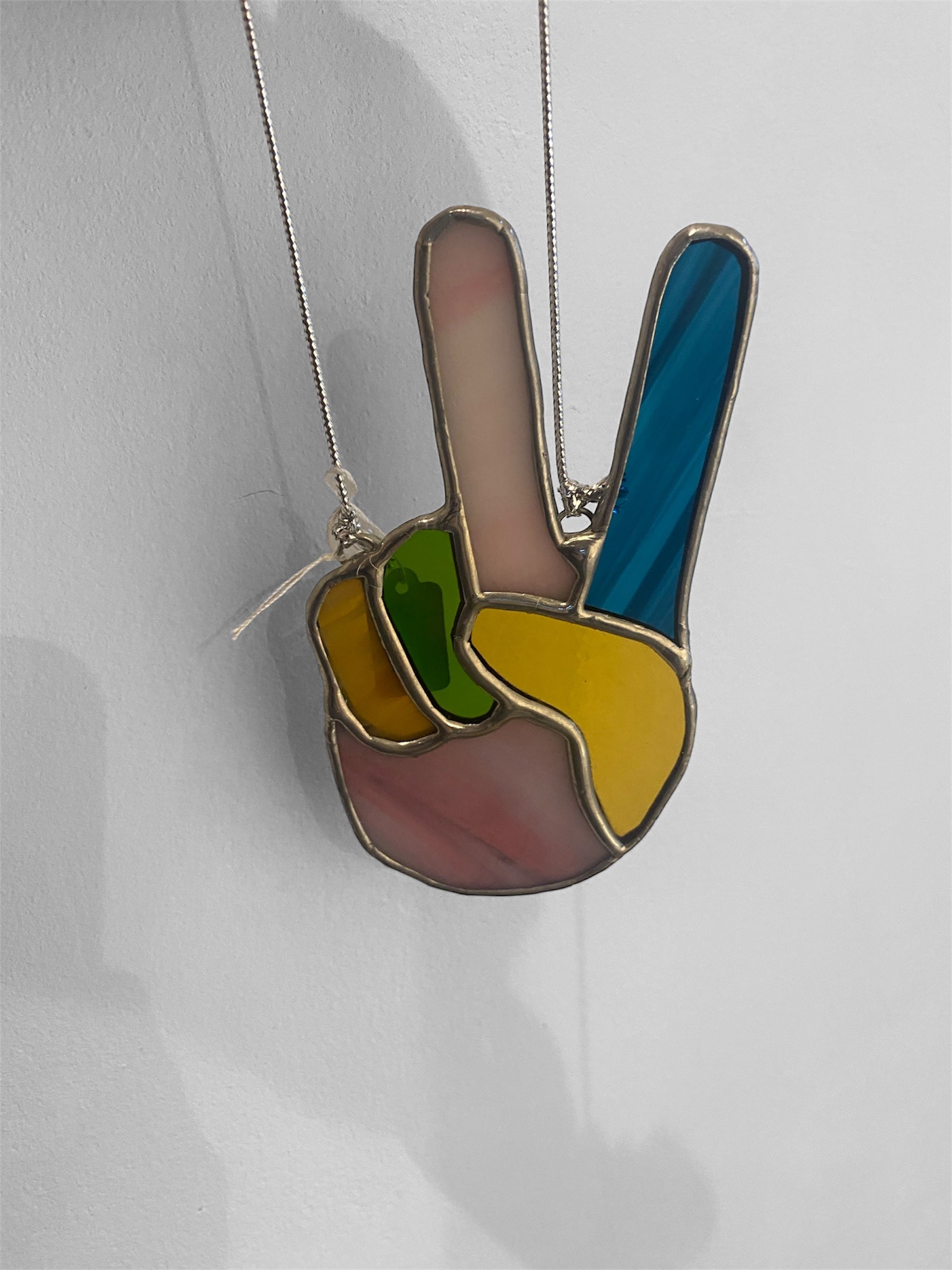 Colorful peace sign decoration on a white background