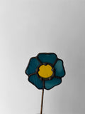 blue and yellow stained glass flower with decorative solder