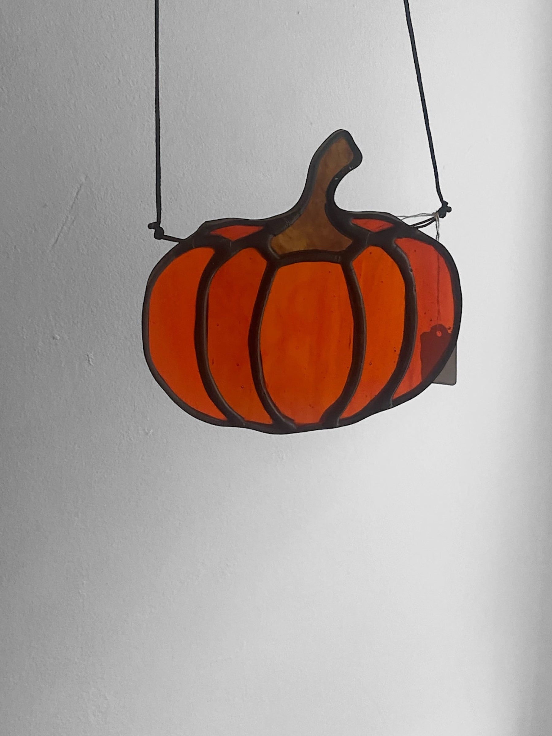 Stained glass orange pumpkin suncatcher